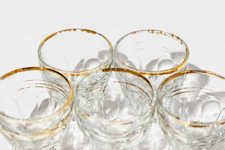 six glasses are arranged and stacked up together