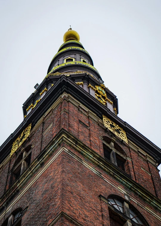 there is a very tall clock tower on the building