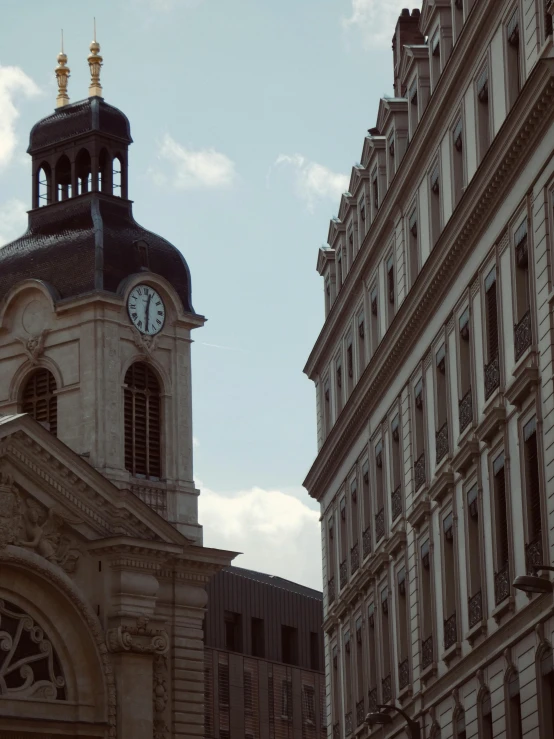 a church with a clock on the top and an ornate design on the outside