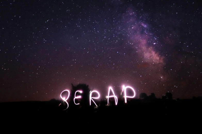 the word scrap spelled with neon lights on a dark night