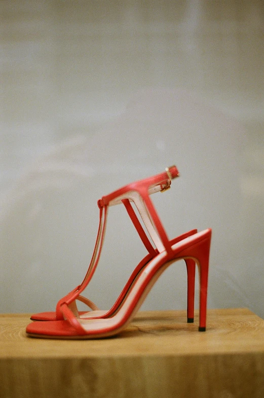 this is an image of red high heel shoes