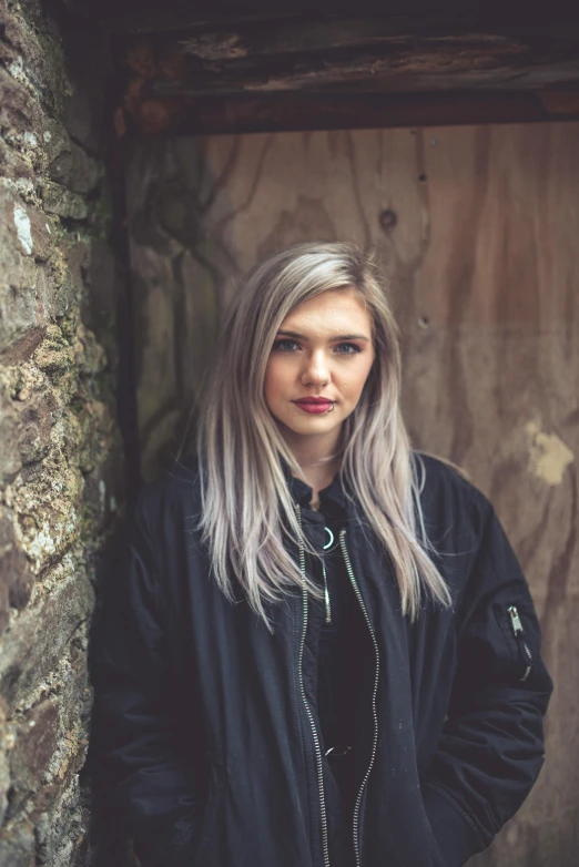 a beautiful blond woman with long grey hair