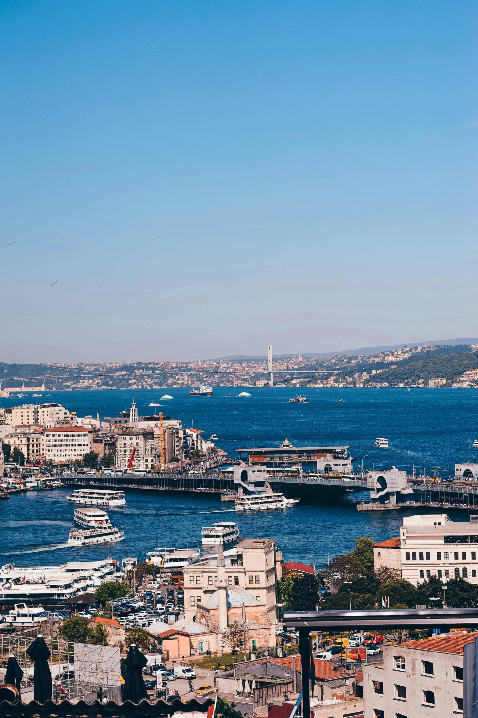 the large bay of water is full of boats