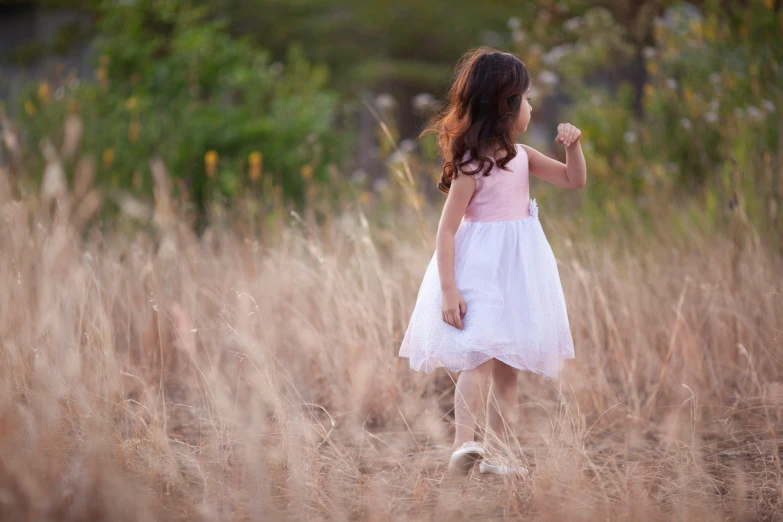 a  is standing in the grass