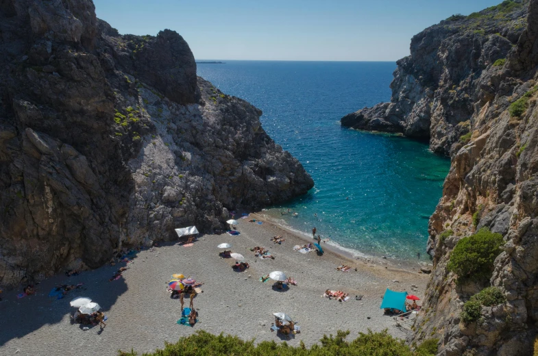 the view of people sunbathing on a beach