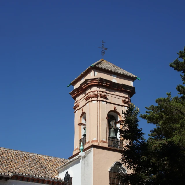 the clock on the tower shows the time