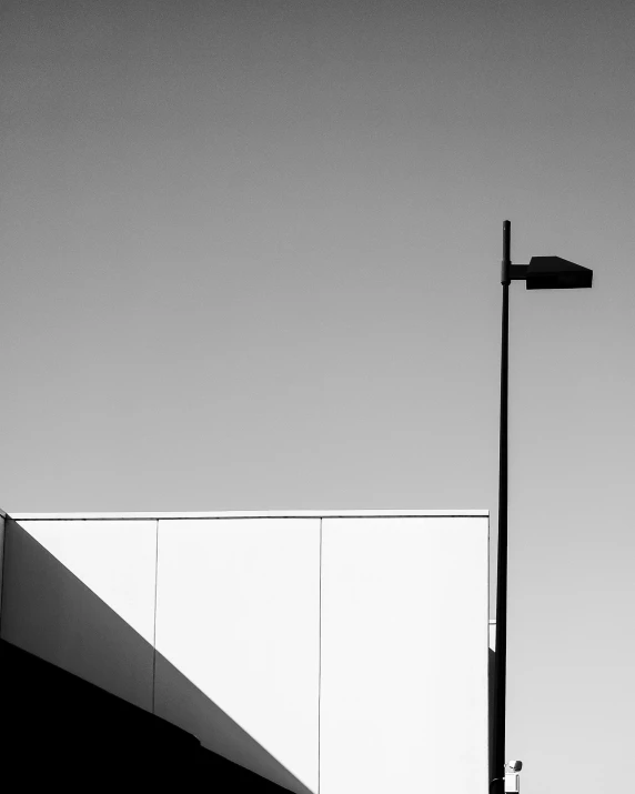 black and white po of a building against a grey sky