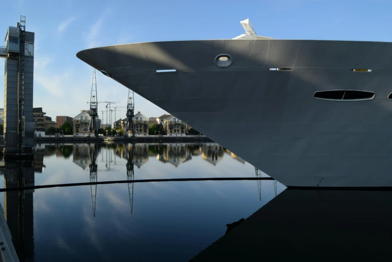 the front of a large white ship in the water