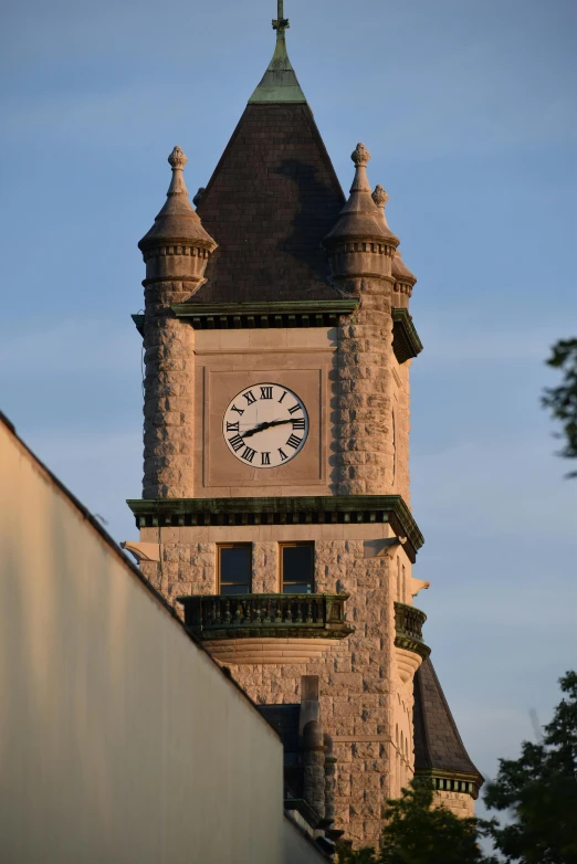 an old clock tower towering above a city