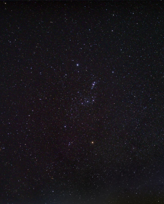 stars, bright lights and a very dark sky at night