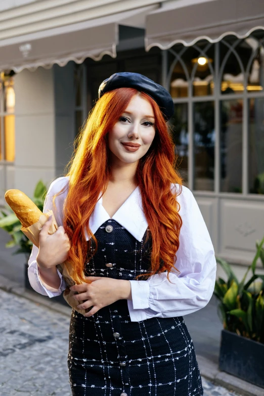 a woman in pirate style clothing holding two fingers