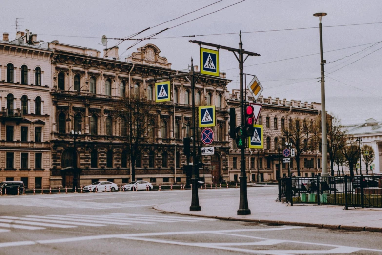 a street corner is shown with some signs on it