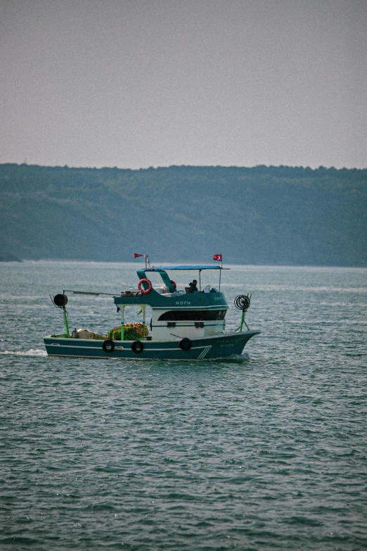 two large boats are driving on the water