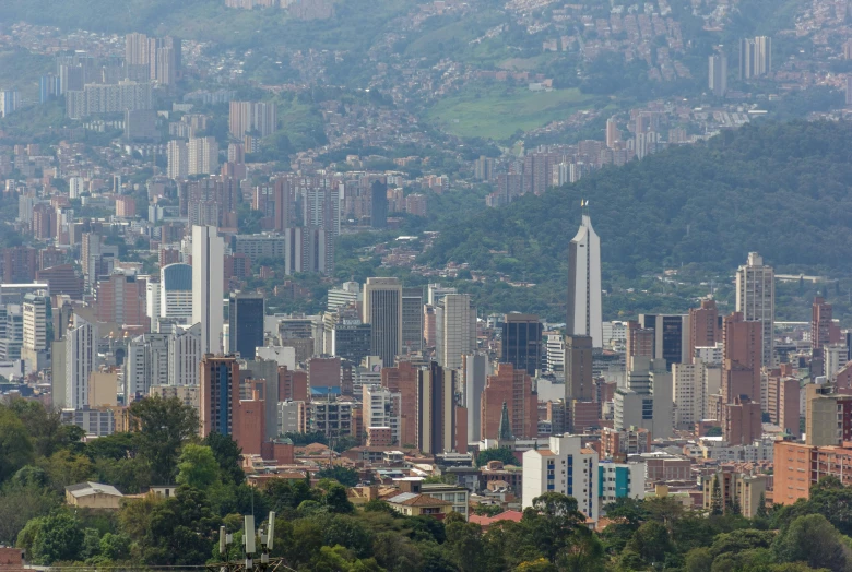 a view of the city from the top of a hill