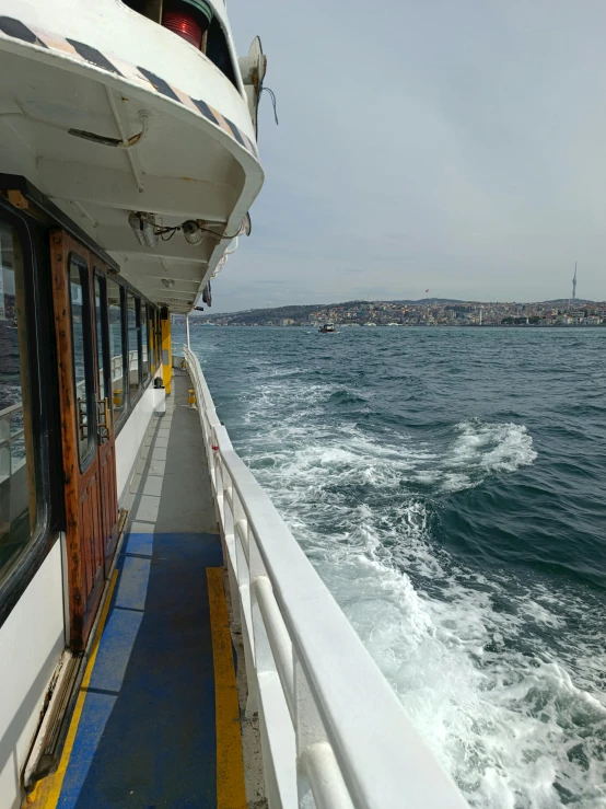 the view from a boat, looking over the water