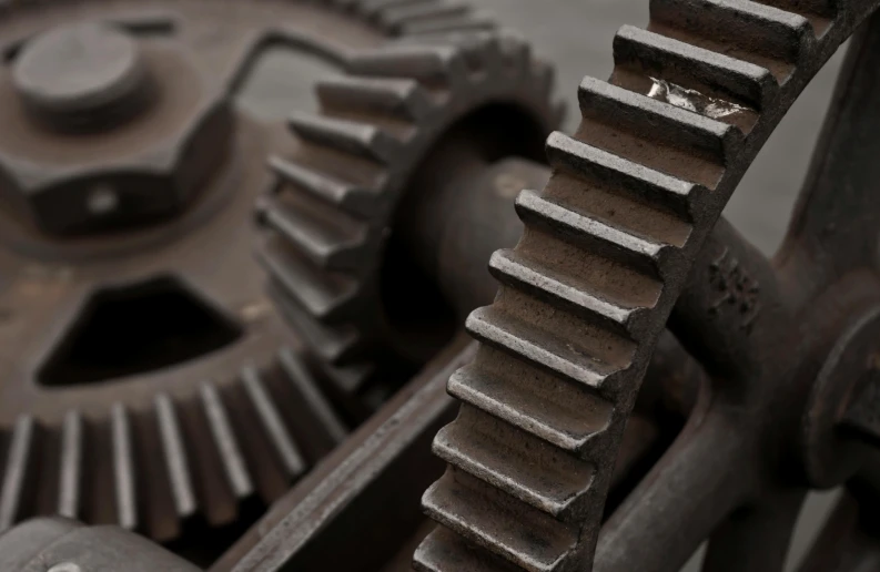 the large gears on a mechanical clock are rusted