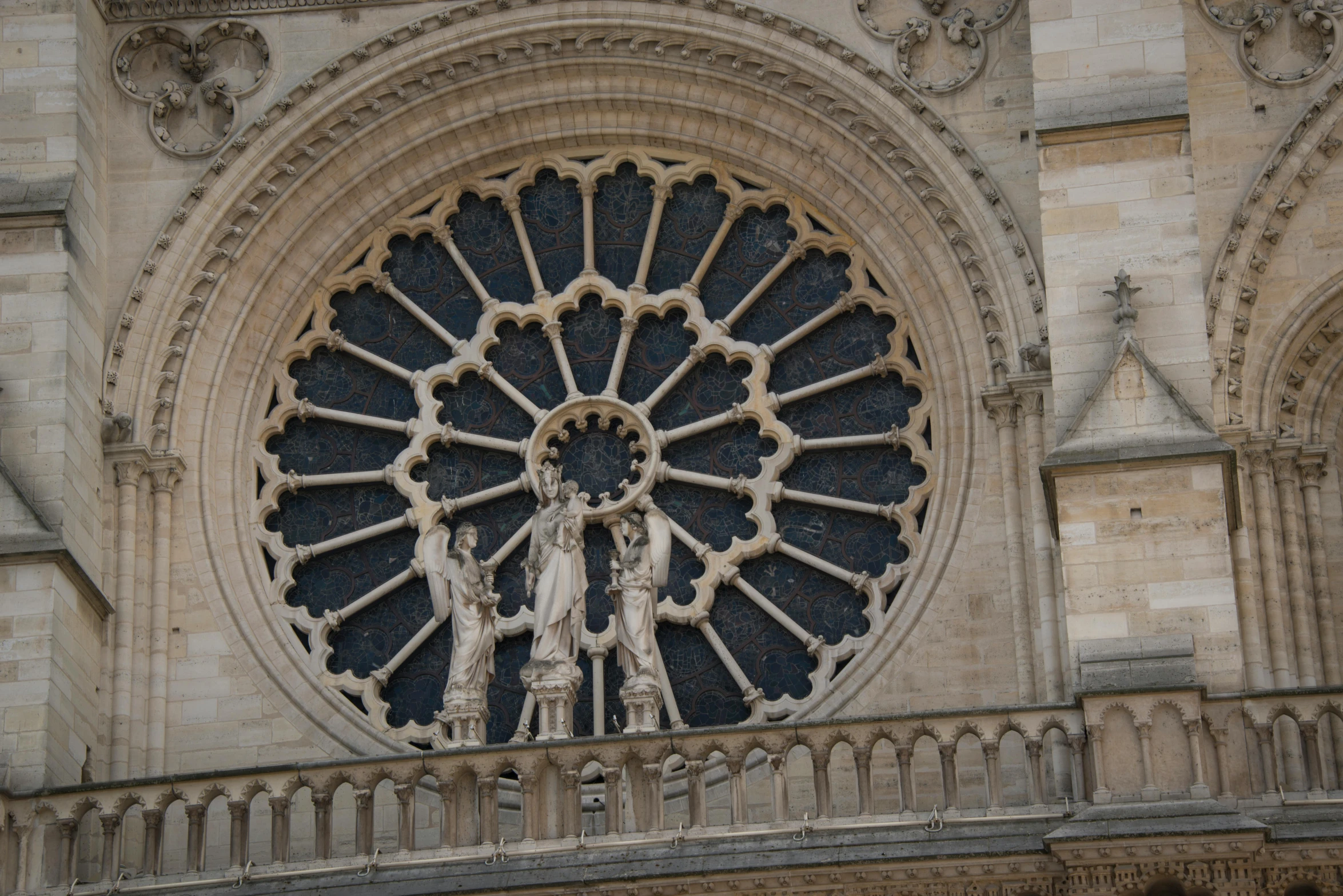 a church with a large circular stained glass window