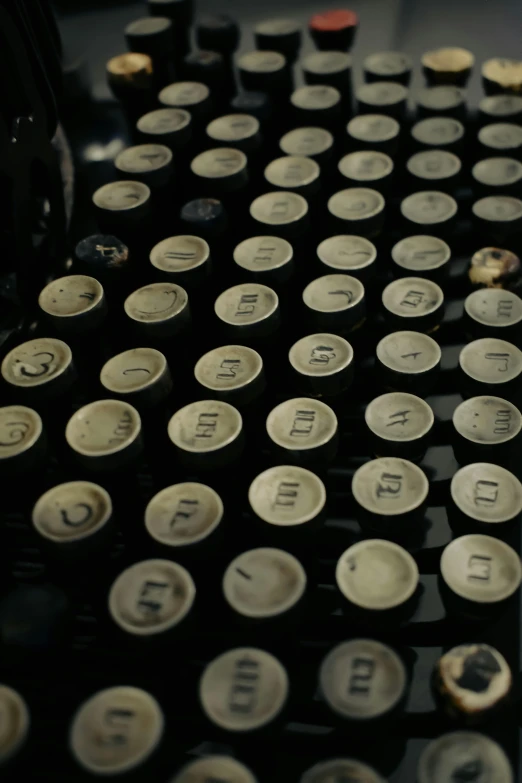 an old fashioned typewriter sits open to pages