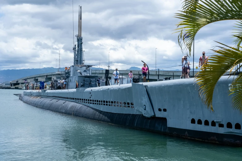 a navy ship and its surroundings are shown