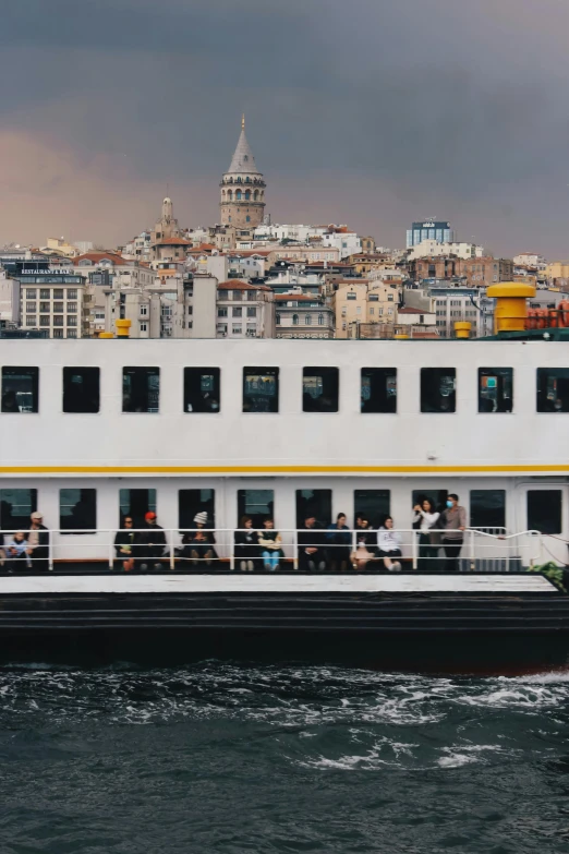 a big ship filled with passengers on the ocean