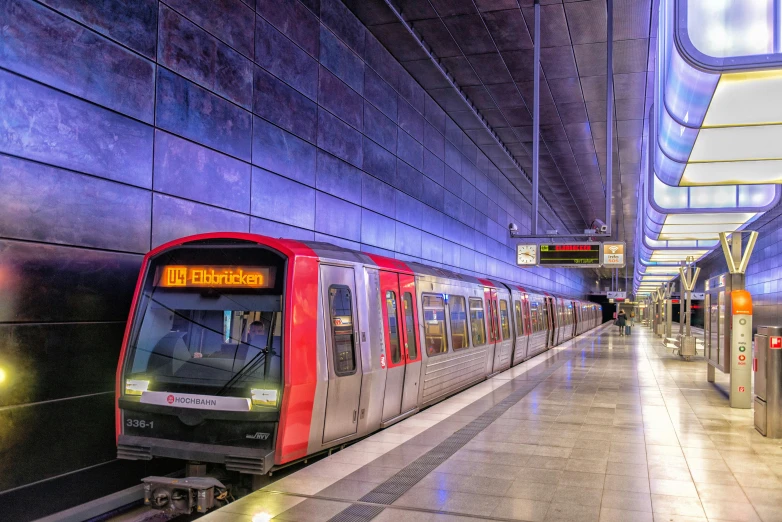 a train parked on the tracks in a tunnel