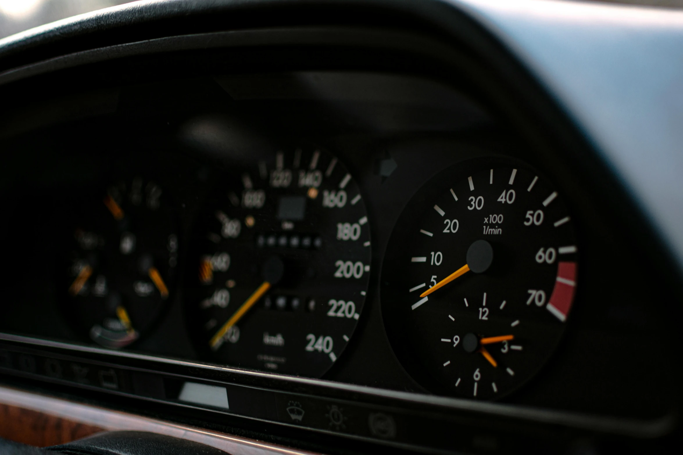 a close - up view of the meter and instrument dials in a car