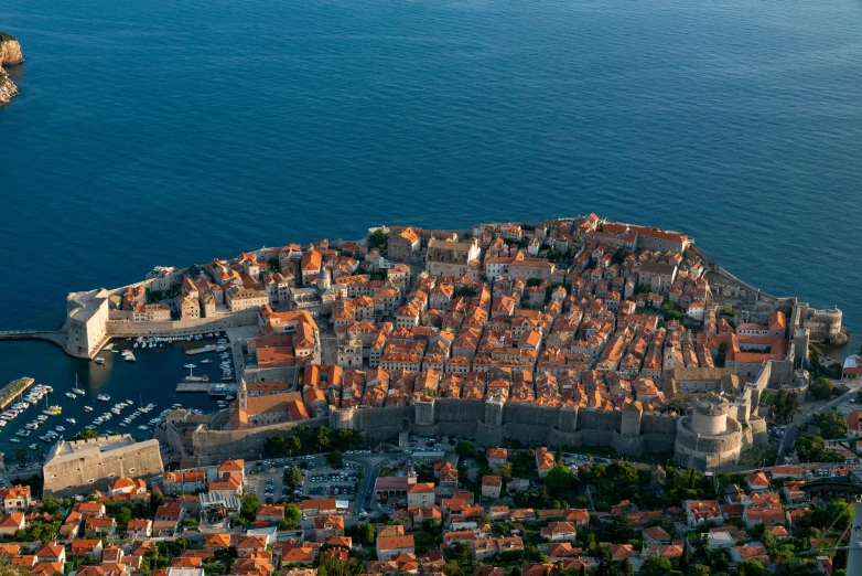 an aerial view of the town and water