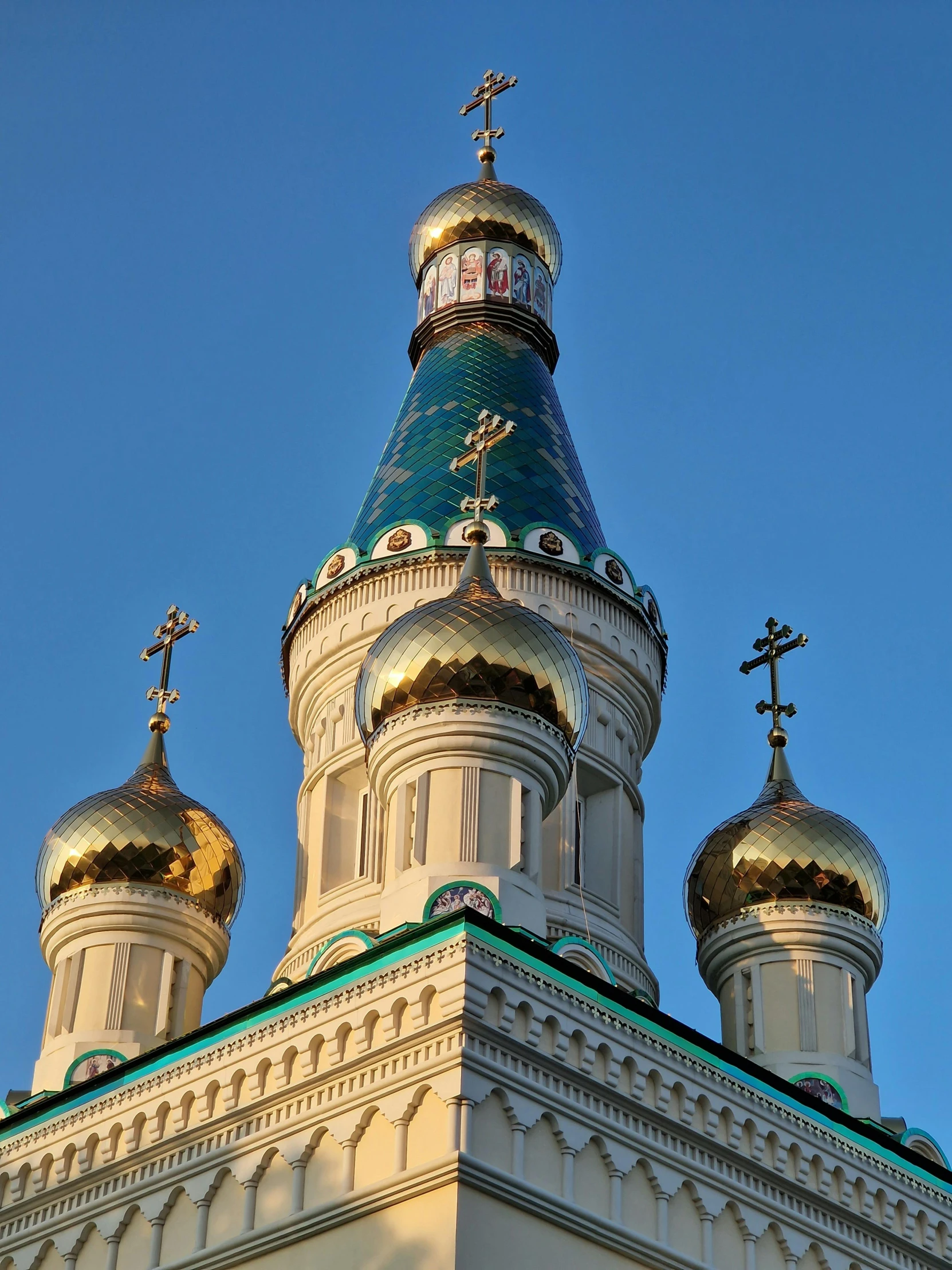 the dome of an old church has crosses on it