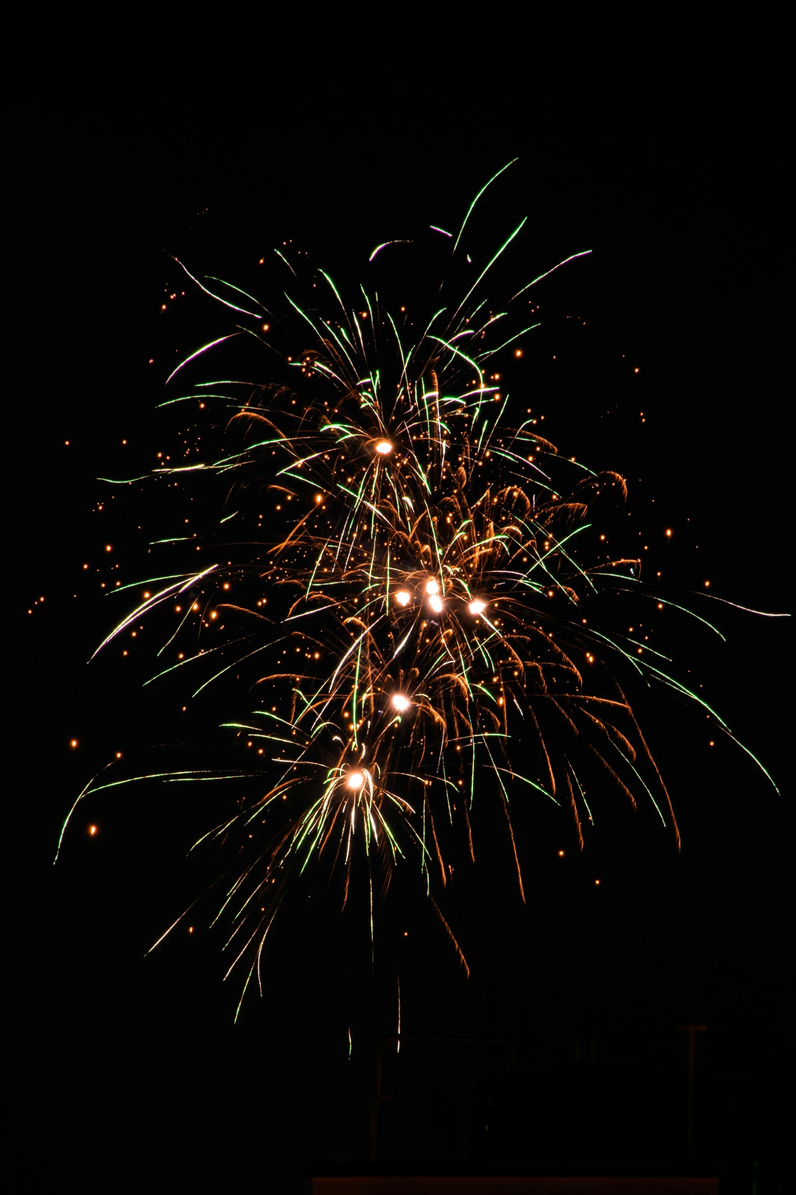 fireworks are being lit up over a building