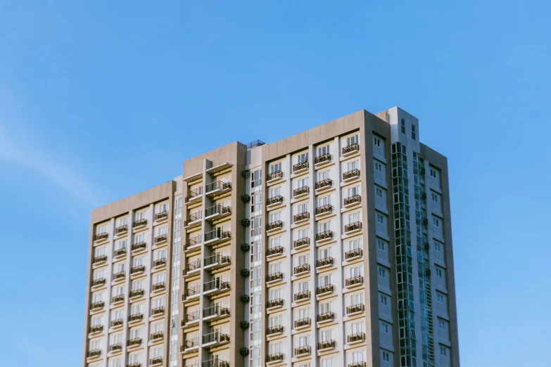 a very tall building with balconies and balcony balconies