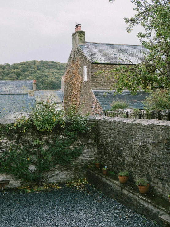 a stone building that has a clock tower on it