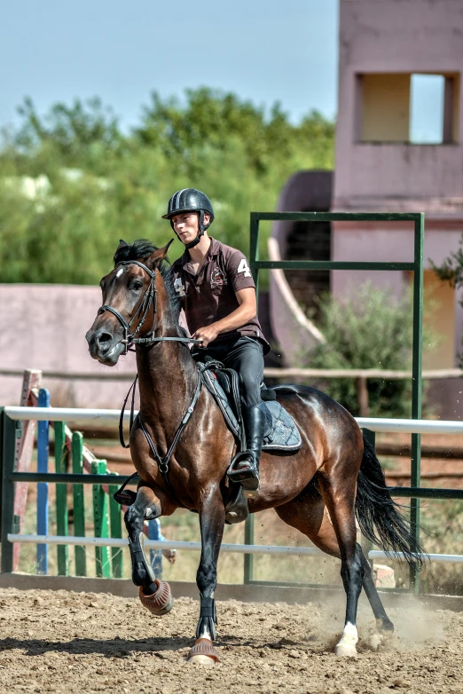 a woman riding on the back of a horse