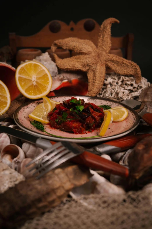 plated food and utensils on pile of shells