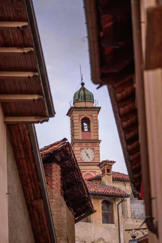 there is a building with a clock tower in the background