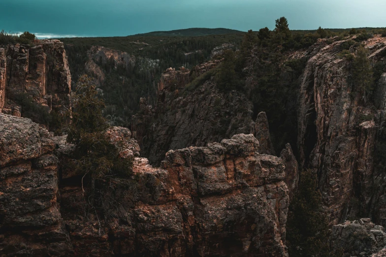 an aerial view of the edge of a rocky landscape