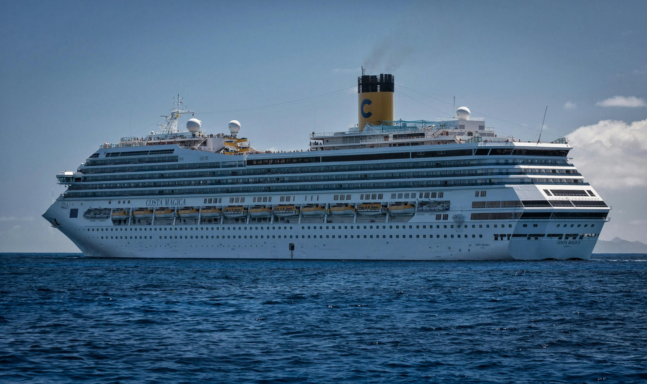 the large cruise ship is in the middle of the water