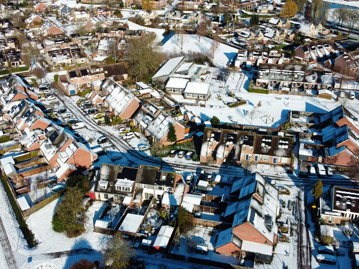 an aerial view of a city in winter