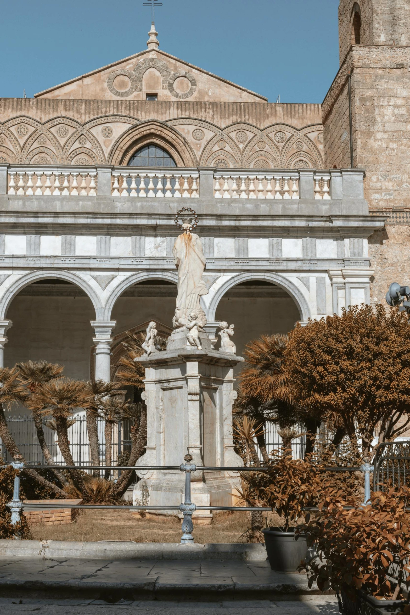 an older cathedral with arches and columns is on the other side of the building