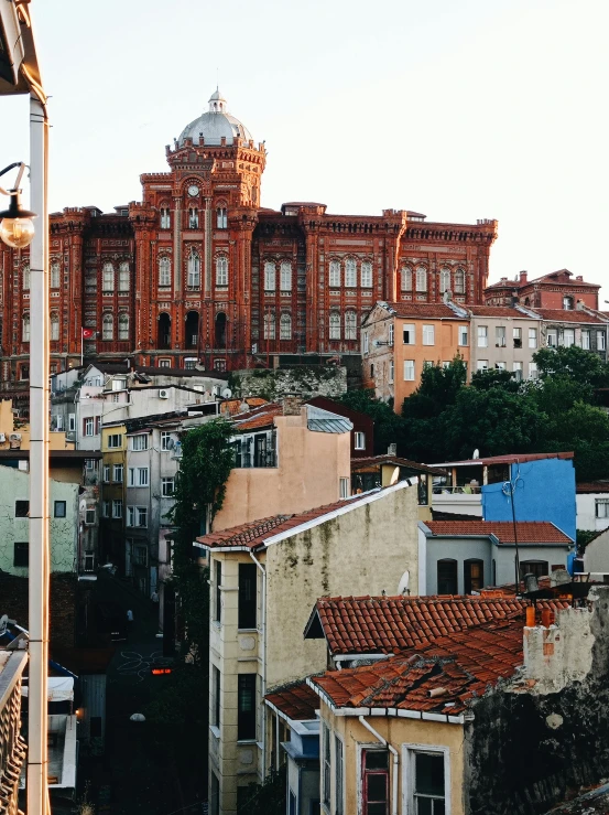 a building with a round white roof in a city