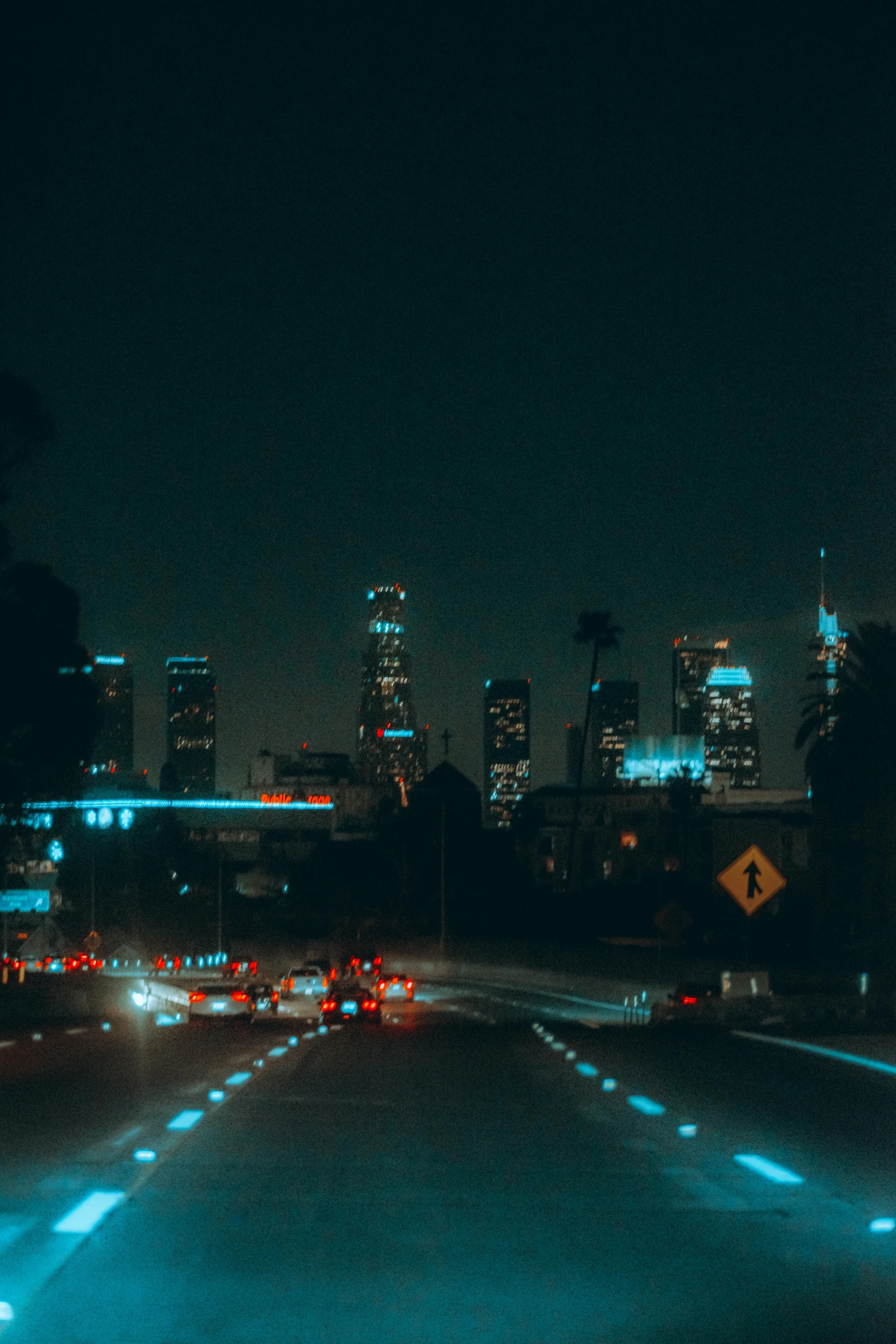 traffic lights and the city lights at night time