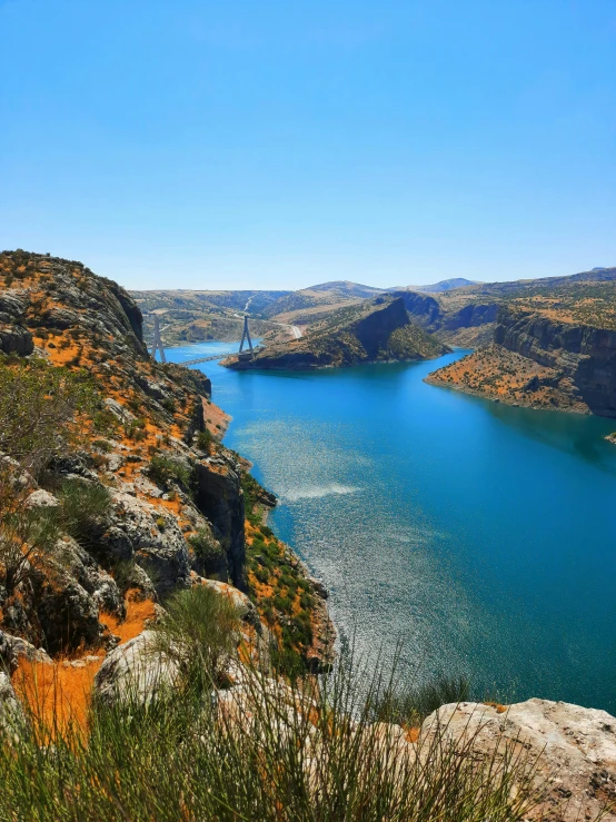 there is a blue lake in a mountainous area