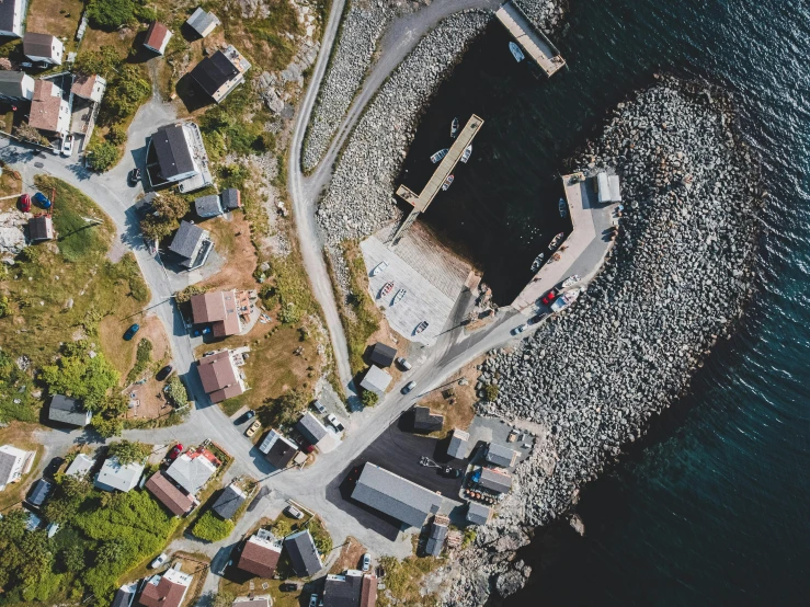 an aerial view shows a dock and houses