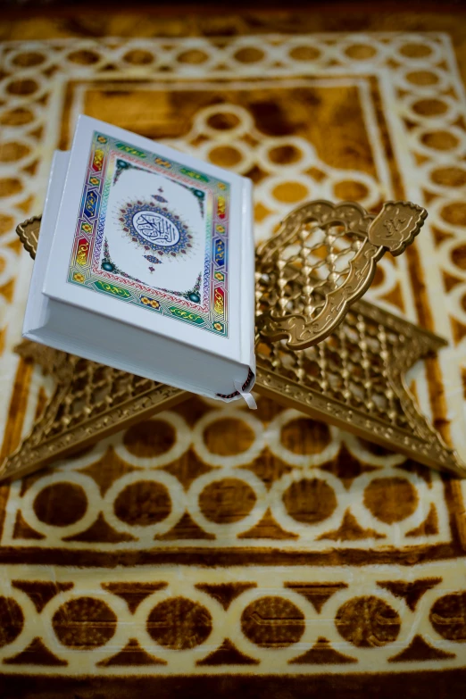 a box with intricate arabic designs on it