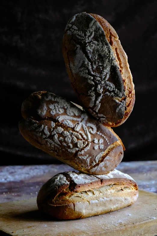 some baked goods are sitting on a  board