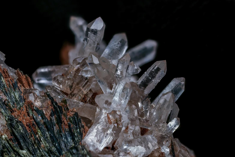 different colored crystals are sitting next to each other