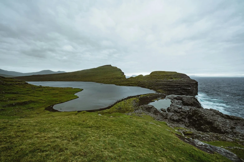 a lake that looks very large on the side of the cliff