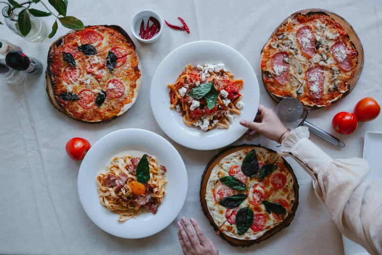 some plates filled with different types of food on a table