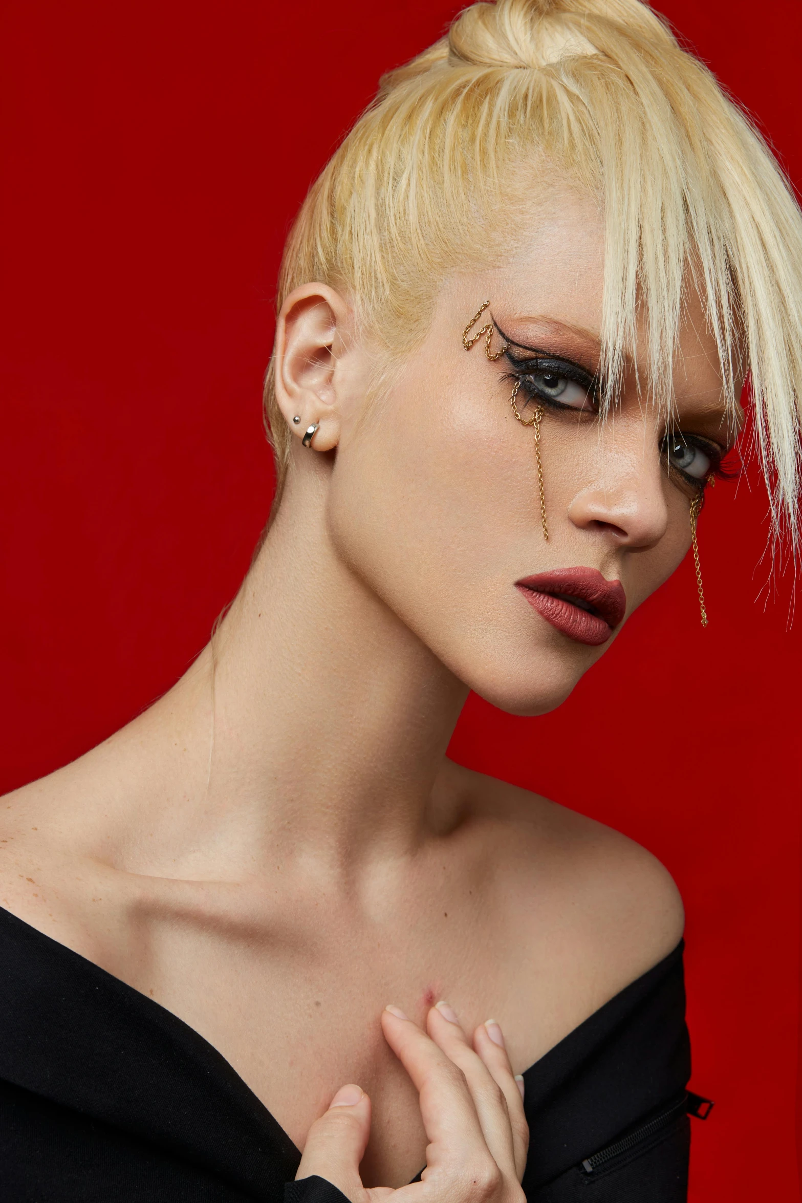 a woman with very unusual hair poses for the camera