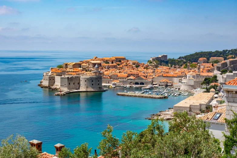 old town and sea with water next to it