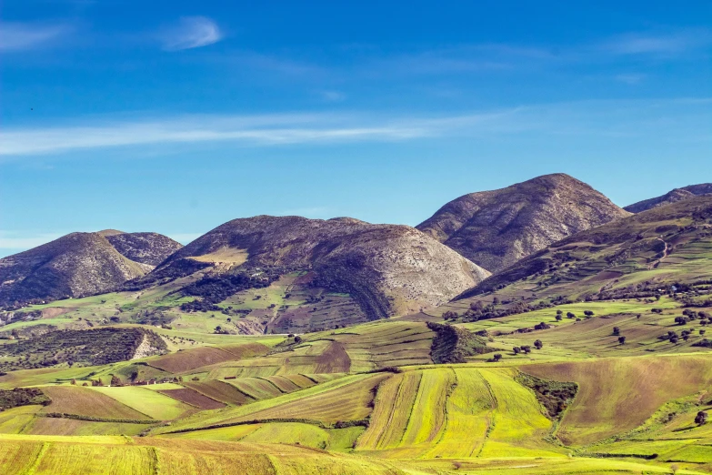 some hills with a sky in the background